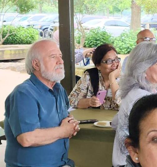 A volunteer offering comfort and spiritual assistance