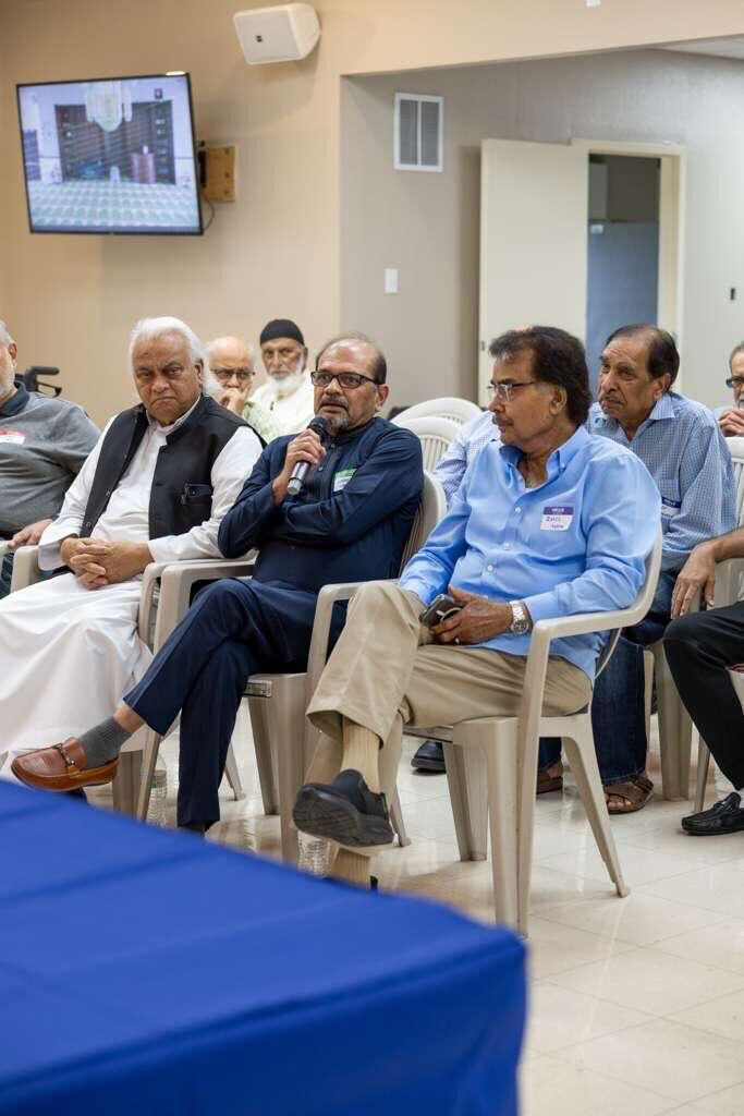 Seniors listening during a community gathering