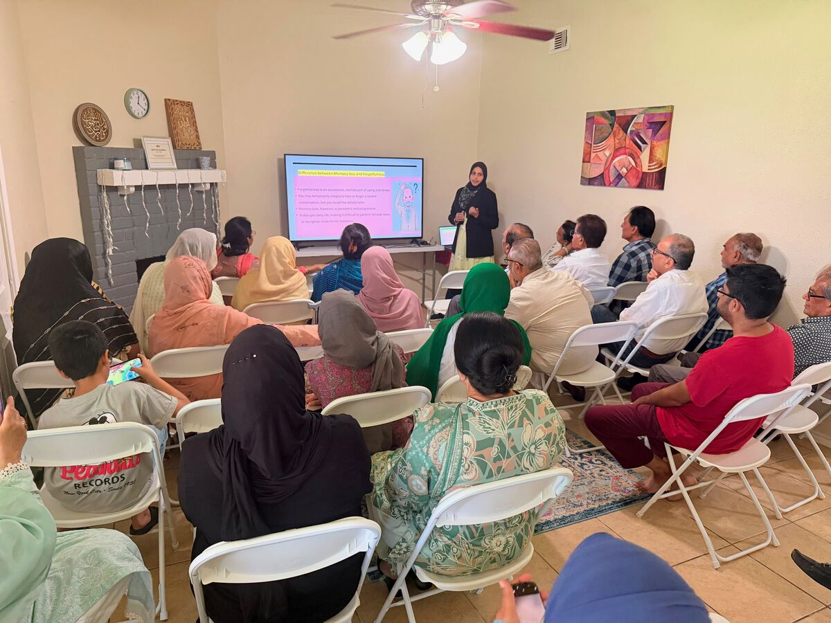 Volunteers and seniors at a community event